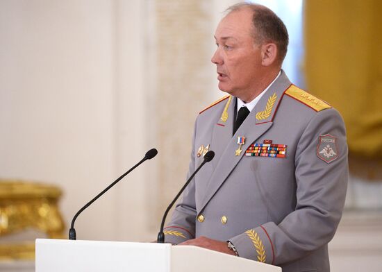 President Vladimir Putin presents state awards to officers who took part in counter-terrorism operation in Syria