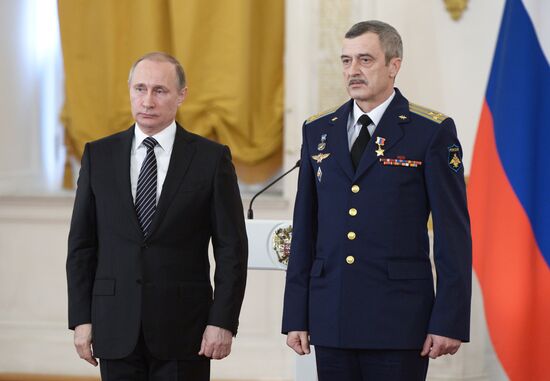 President Vladimir Putin presents state awards to officers who took part in counter-terrorism operation in Syria