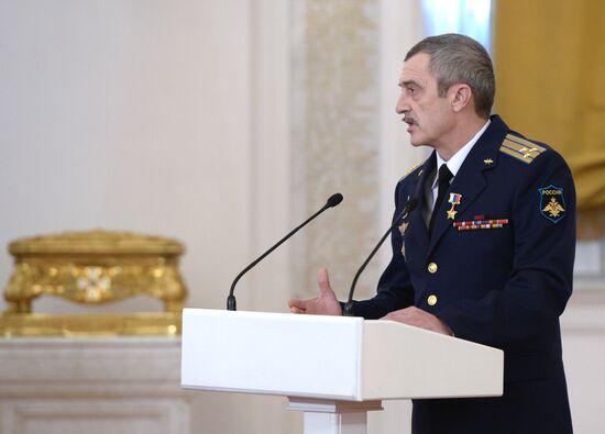 President Vladimir Putin presents state awards to officers who took part in counter-terrorism operation in Syria
