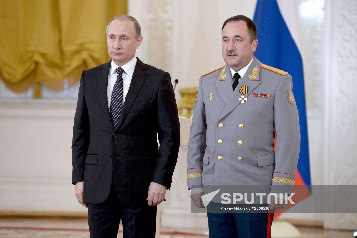 President Vladimir Putin presents state awards to officers who took part in counter-terrorism operation in Syria