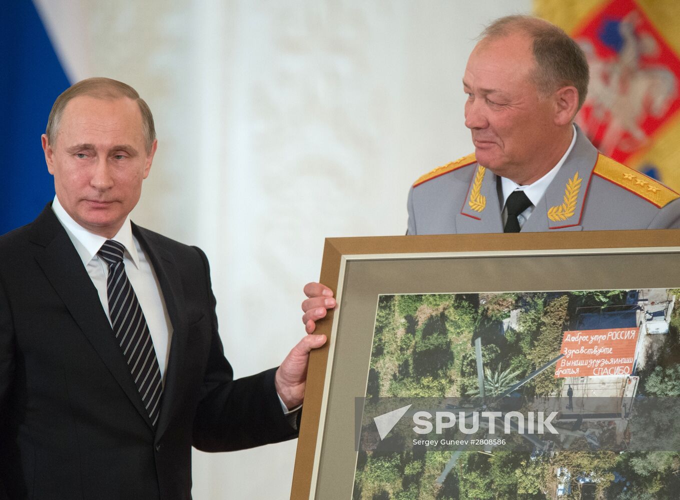 President Vladimir Putin presents state awards to officers who took part in counter-terrorism operation in Syria