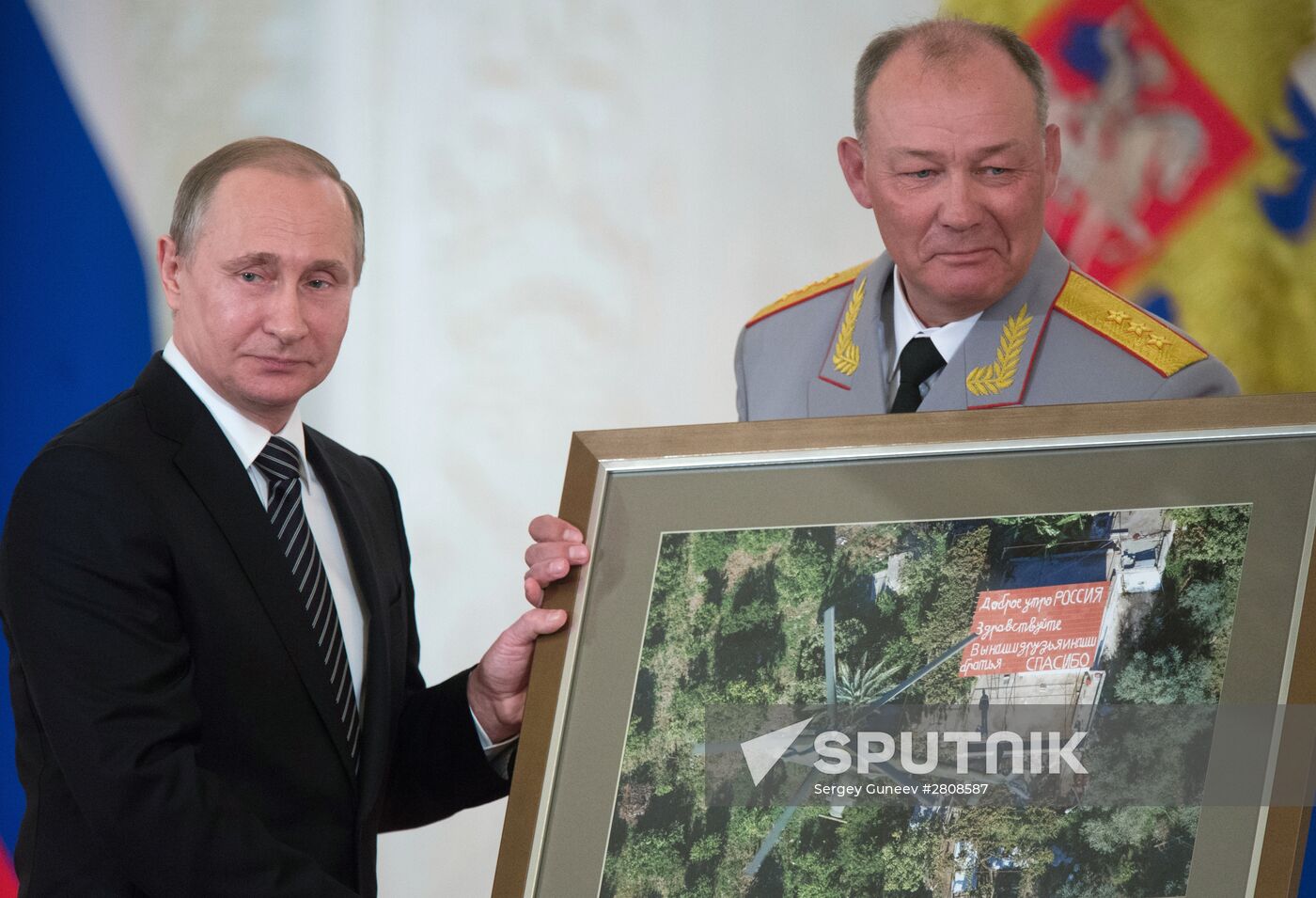 President Vladimir Putin presents state awards to officers who took part in counter-terrorism operation in Syria