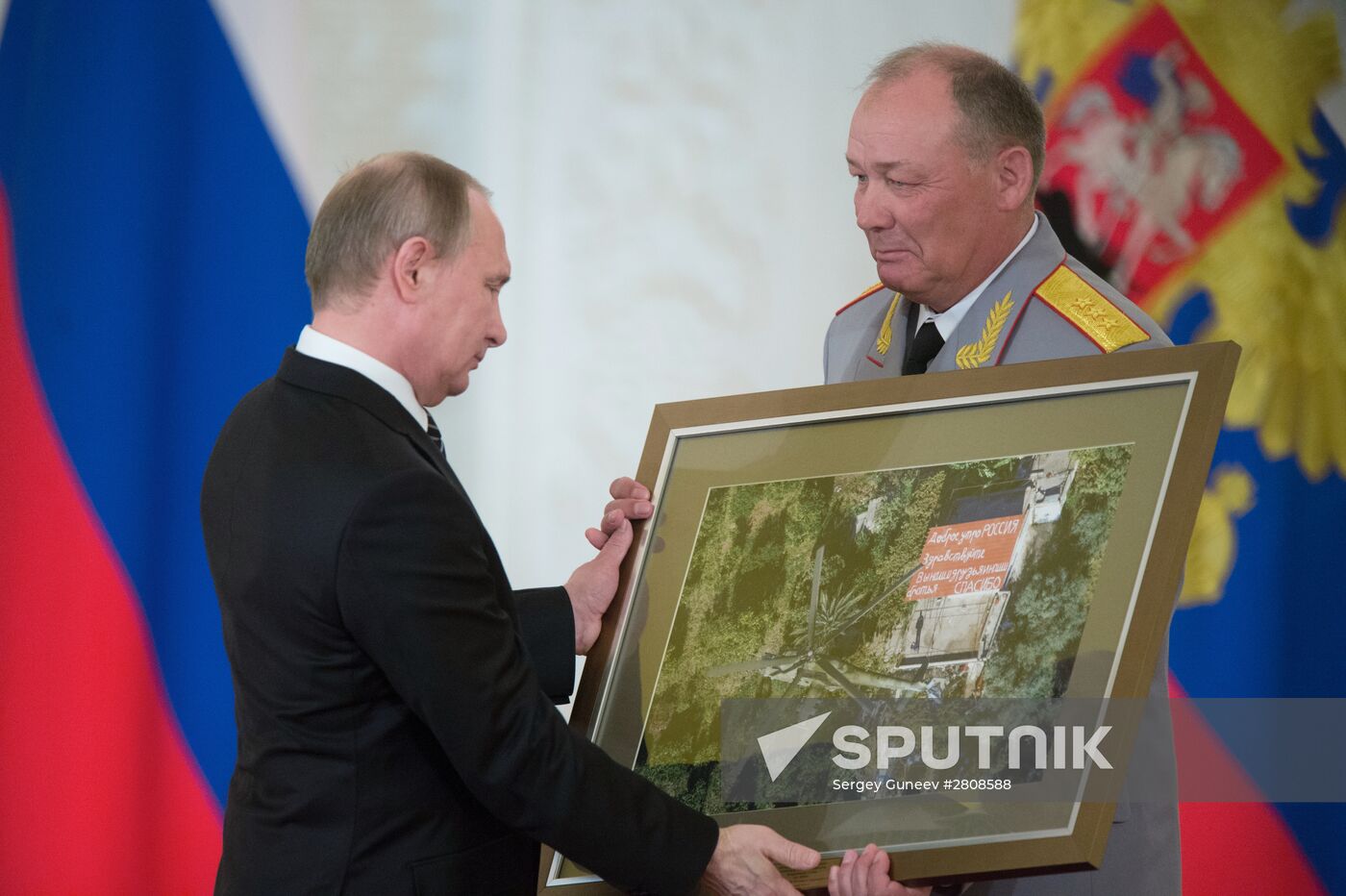 President Vladimir Putin presents state awards to officers who took part in counter-terrorism operation in Syria
