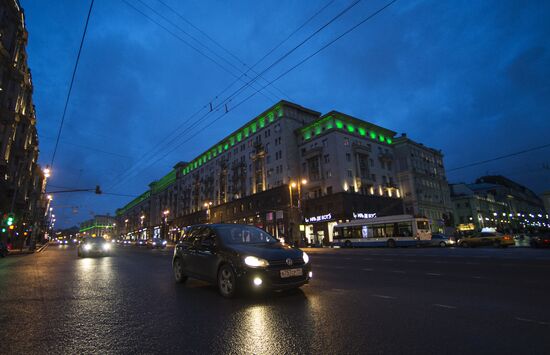 Buildings illuminated green for St. Patrick's Day