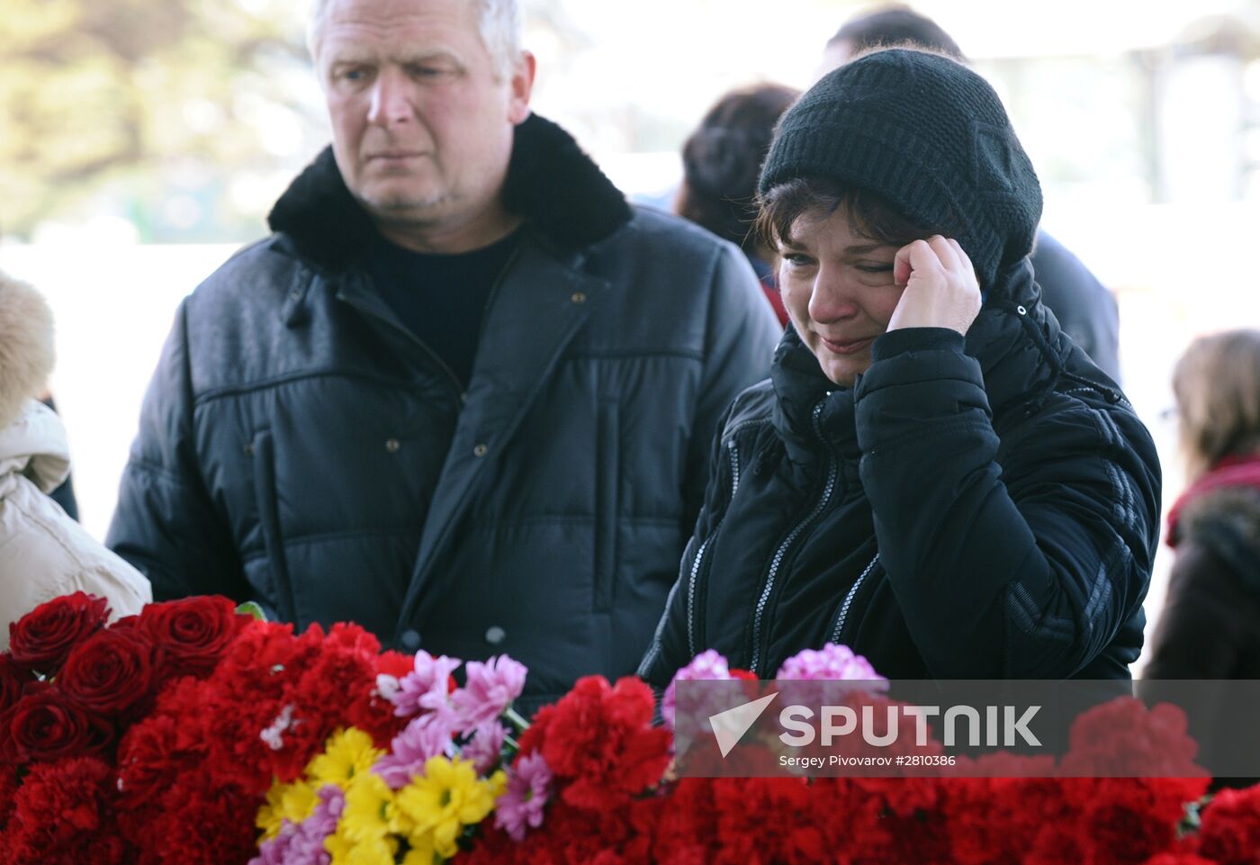 People bring flowers to Rostov-on-Don airport to commemmorate memory of plane crash victims