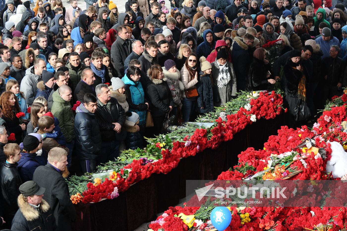 People bring flowers to Rostov-on-Don airport to mourn jet crash victims