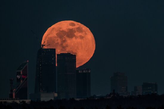 Full moon over Moscow City International Business Center