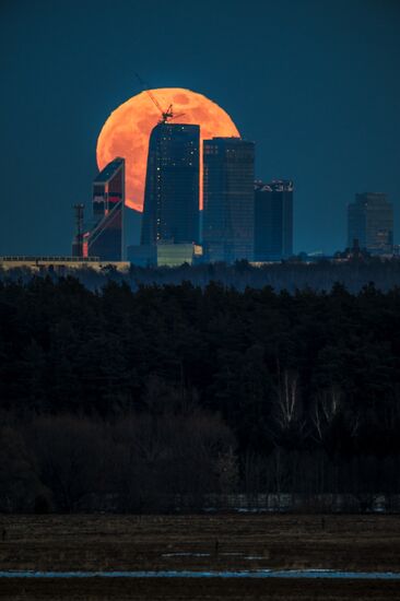 Full moon over Moscow City International Business Center
