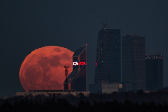 Full moon over Moscow City International Business Center