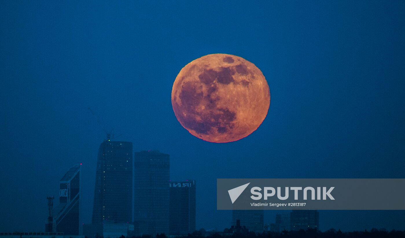 Full moon over Moscow City International Business Center