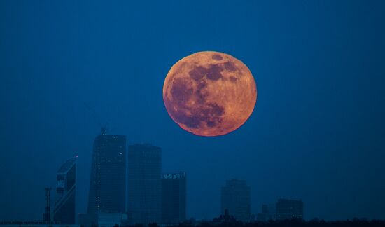 Full moon over Moscow City International Business Center