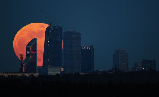 Full moon over Moscow City International Business Center