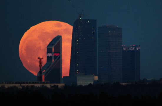 Full moon over Moscow City International Business Center