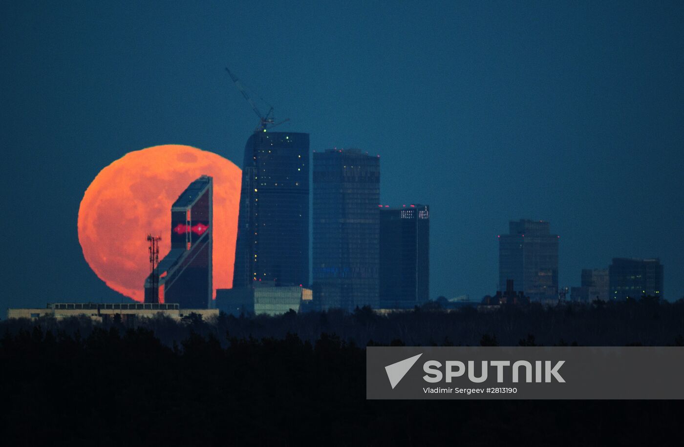 Full moon over Moscow City International Business Center