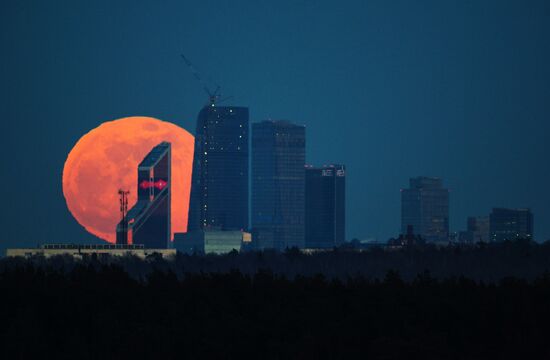 Full moon over Moscow City International Business Center