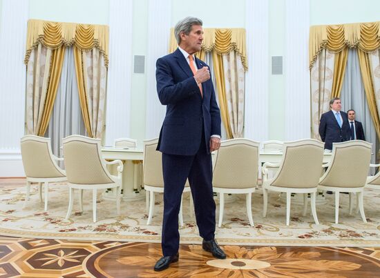President Vladimir Putin meets with US Secretary of State John Kerry
