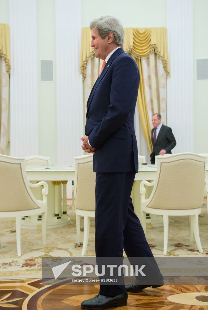 President Vladimir Putin meets with US Secretary of State John Kerry