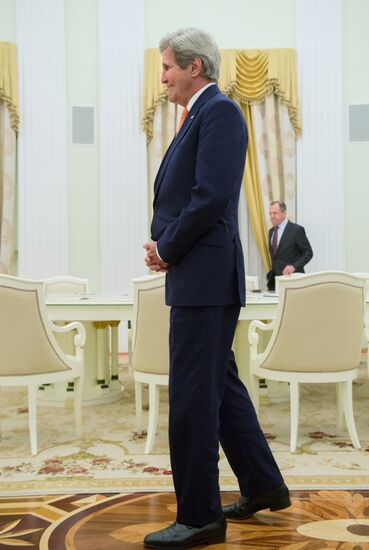 President Vladimir Putin meets with US Secretary of State John Kerry