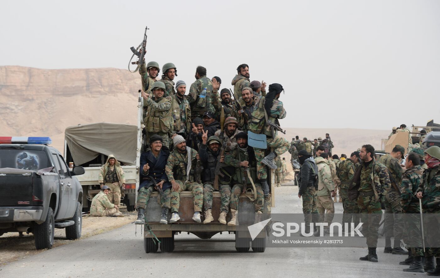 Syrian army and militias fight for Palmyra