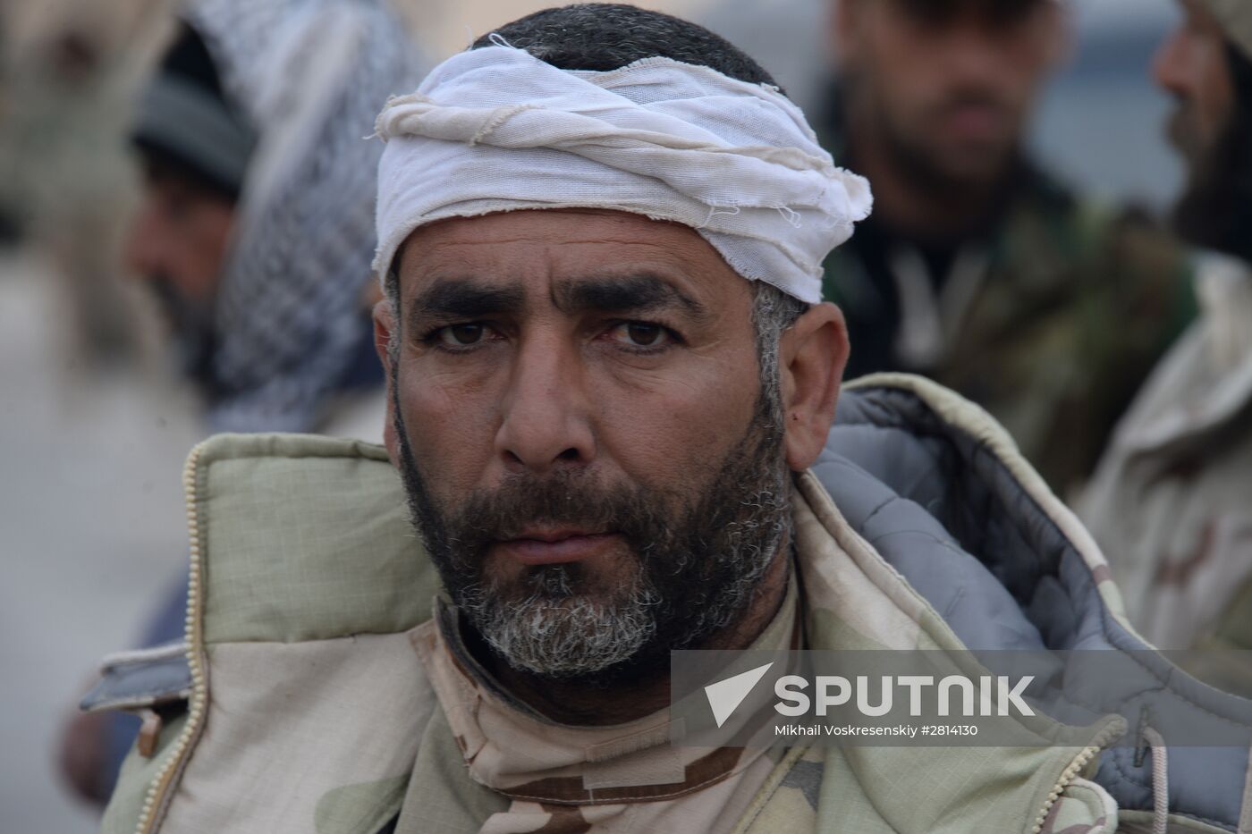 Syrian government army and militia fight for Palmyra