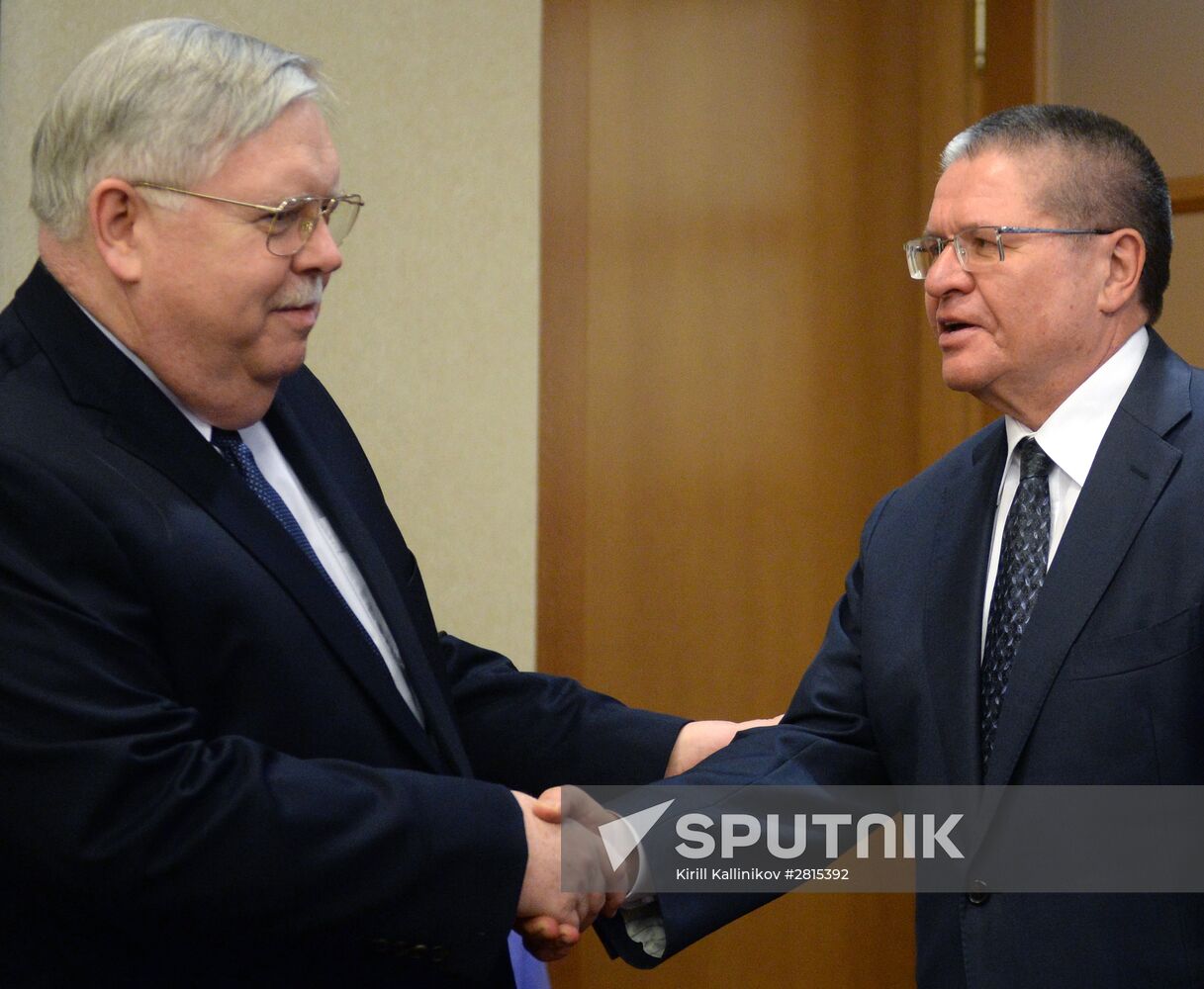 Russian Economic Development Minister Aleksei Ulyukaev meets with US Ambassador John Tefft