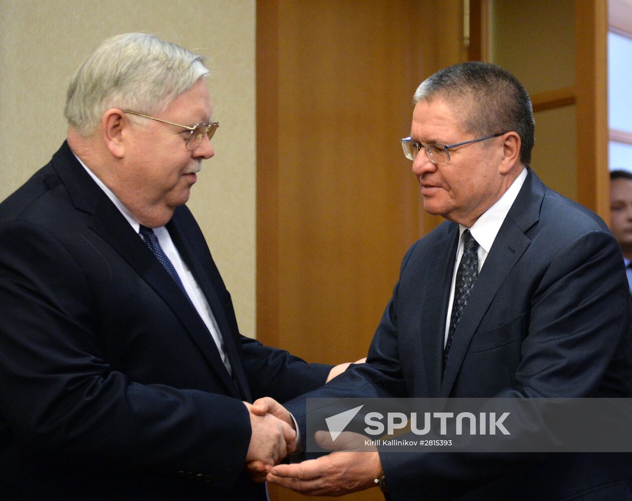 Russian Economic Development Minister Aleksei Ulyukaev meets with US Ambassador John Tefft