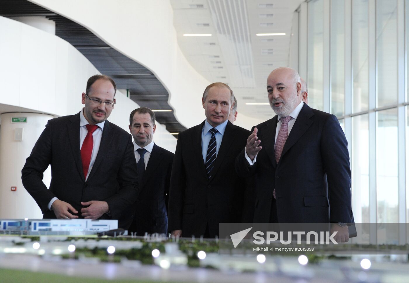 March 29, 2016. Russian President Vladimir Putin, second right, visits the new terminal of Strigino Airport in Nizhny Novgorod. The terminal was built for the 2018 FIFA World Cup and is operating in test mode. From right: Nizhny Novgorod Region Governor Valery Shantsev, Renova Group chairman of the board Viktor Vekselberg. Second left: Presidential Plenipotentiary Envoy to the Volga Federal District Mikhail Babich. Location: Russia, Nizhny Novgorod. Author: Mikhail Klimentyev/Sputnik. President Vladimir Putin's working trip to Nizhny Novgorod