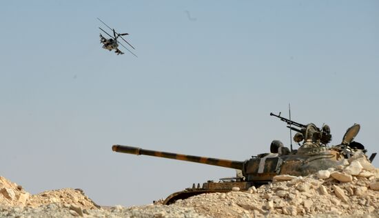 A Kamov Ka-52 Hokum-B attack helicopter hits targets in Syria