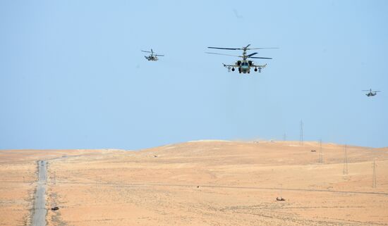 A Kamov Ka-52 Hokum-B attack helicopter hits targets in Syria