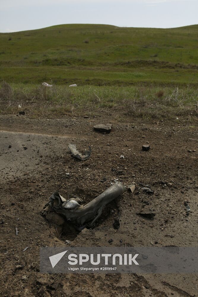 An exploded missile of the Smerch multiple rocket launcher in the Nagorno-Karabakh conflict area. Location: Nagornо-Karabakh. Author: Vagan Stepanyan/Sputnik. Situation near Madagis village in the Karabakh conflict zone