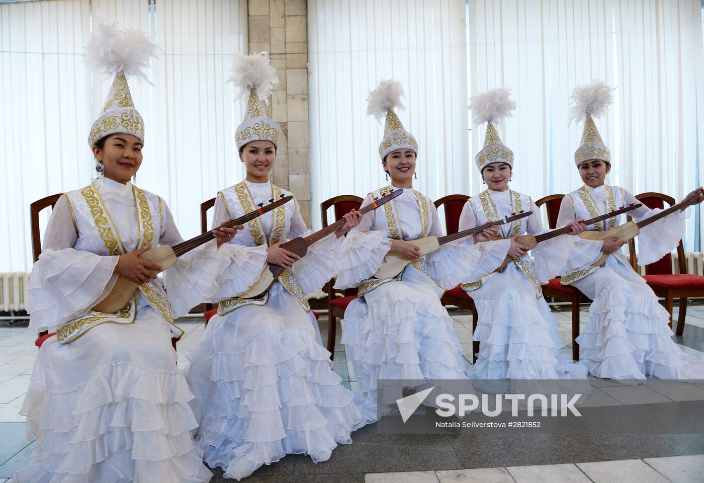 Girls in traditional Kyrgyz costumes