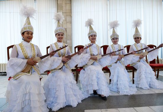 Girls in traditional Kyrgyz costumes