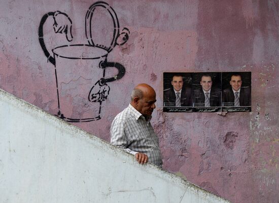 Pre-election posters of candidates for Syrian parliamentary elections