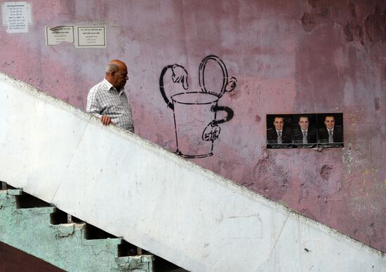 Pre-election posters of candidates for Syrian parliamentary elections