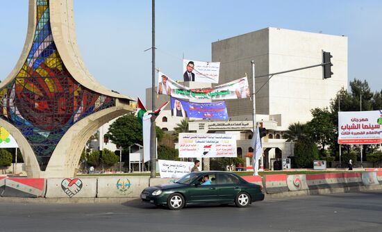 Pre-election posters of candidates for Syrian parliamentary elections