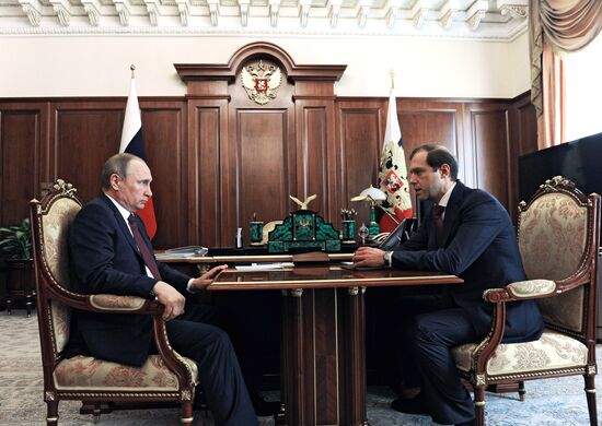 President Vladimir Putin meets with Industry/Trade Minister Denis Manturov
