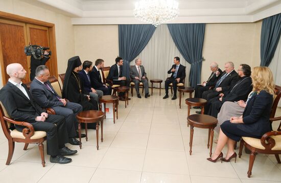 Syrian President Bashar al-Assad meets with Russian parliamentary delegation