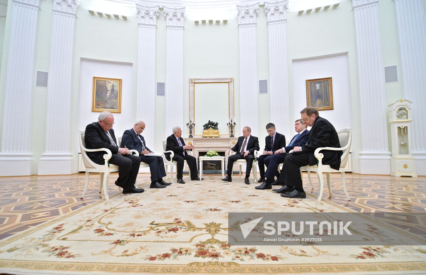 Russian President Vladimir Putin meets with Palestinian Authority President Mahmoud Abbas