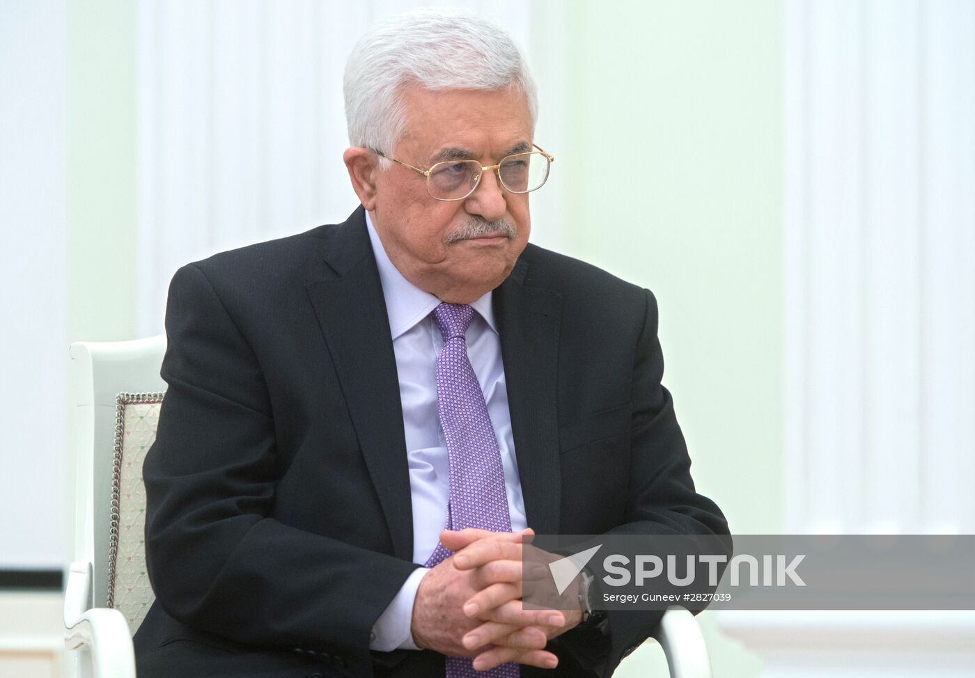 Russian President Vladimir Putin meets with Palestinian Authority President Mahmoud Abbas