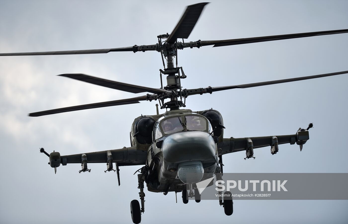 A Ka-52 "Alligator" combat helicopter during a joint rehearsal held by aviation parade teams for the Victory Day parade, at the Kubinka military air base in the Moscow region. Location: Russia, Moscow region. Author: Vladimir Astapkovich/Sputnik. Joint rehearsal of aerobatic teams before the Victory Parade