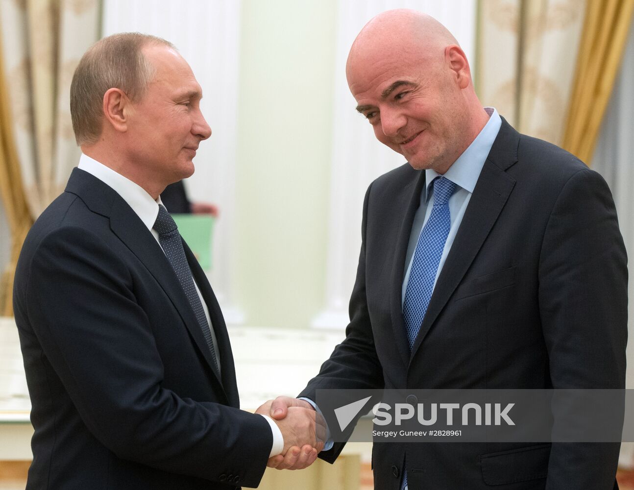 Russian President Vladimir Putin meets with FIFA President Gianni Infantino