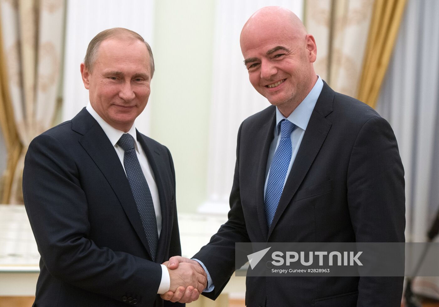 Russian President Vladimir Putin meets with FIFA President Gianni Infantino