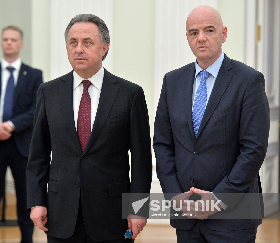 Russian President Vladimir Putin meets with FIFA President Gianni Infantino