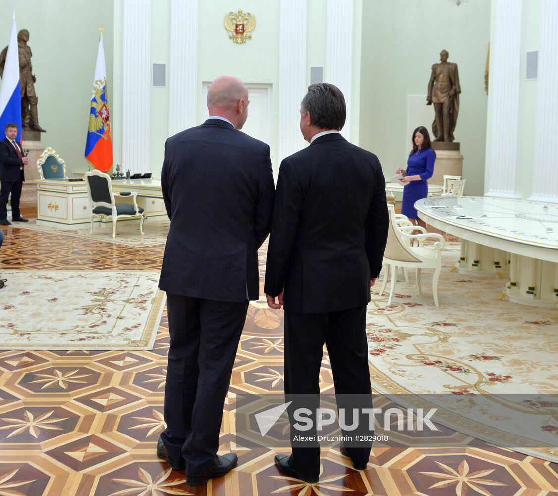 Russian President Vladimir Putin meets with FIFA President Gianni Infantino