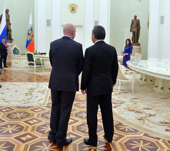 Russian President Vladimir Putin meets with FIFA President Gianni Infantino