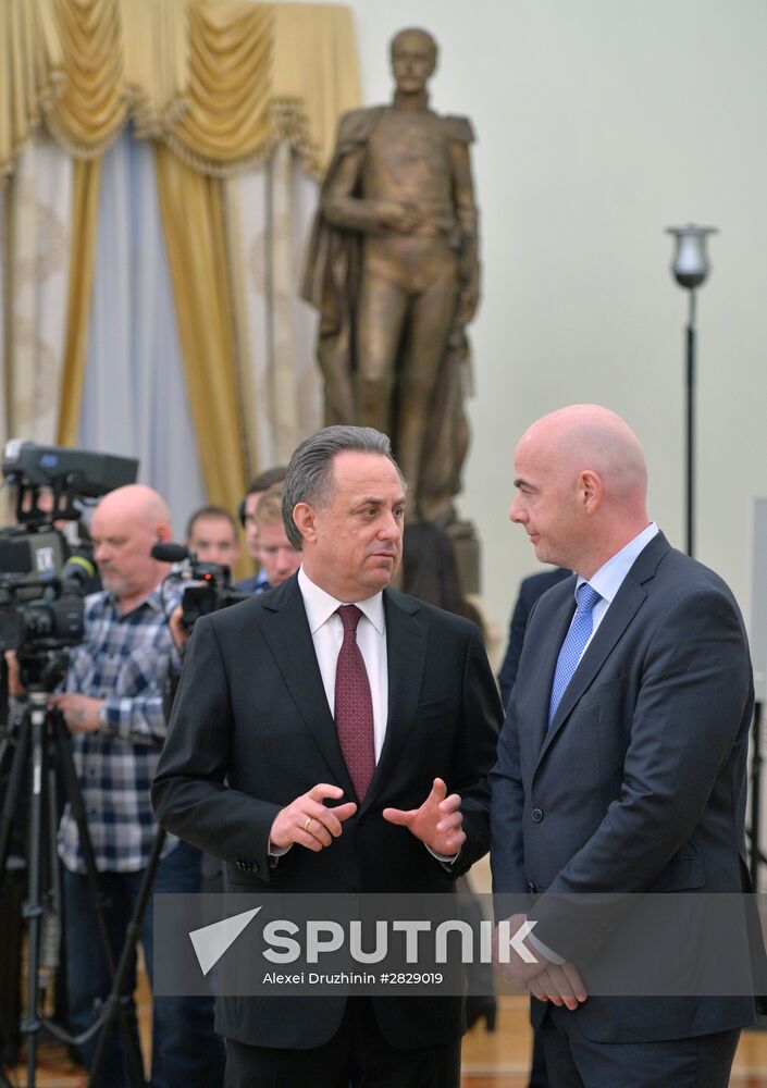 Russian President Vladimir Putin meets with FIFA President Gianni Infantino