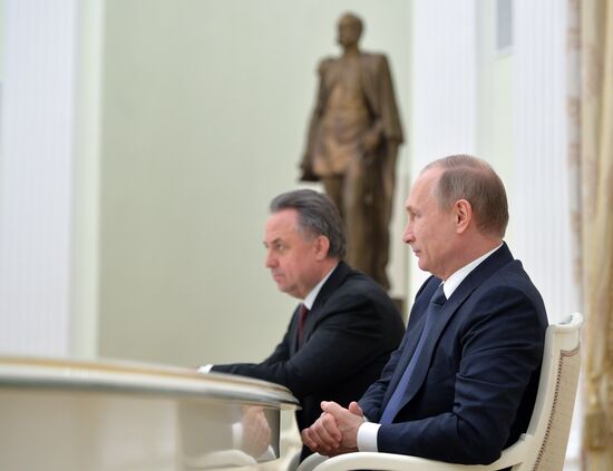 Russian President Vladimir Putin meets with FIFA President Gianni Infantino