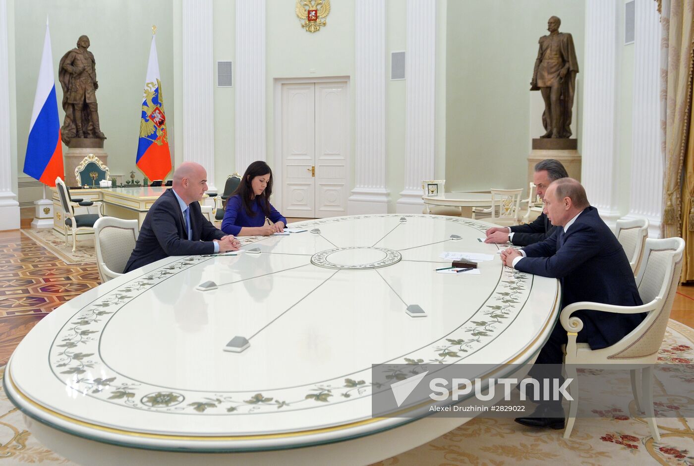 Russian President Vladimir Putin meets with FIFA President Gianni Infantino