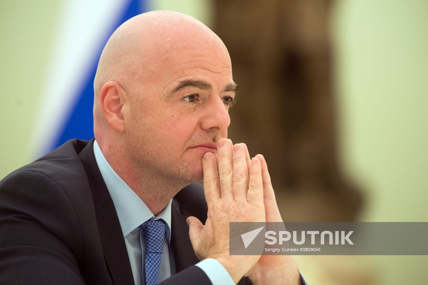 Russian President Vladimir Putin meets with FIFA President Gianni Infantino