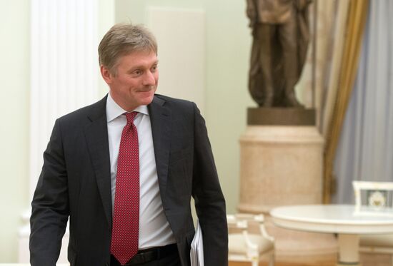 Russian President Vladimir Putin meets with FIFA President Gianni Infantino